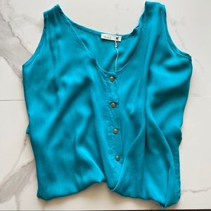 Turquoise cold shoulder top. Mine name brand